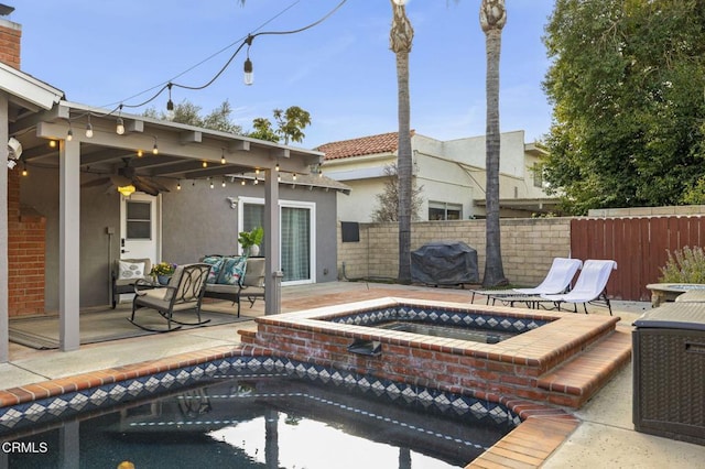 exterior space with ceiling fan, a pool with hot tub, and area for grilling