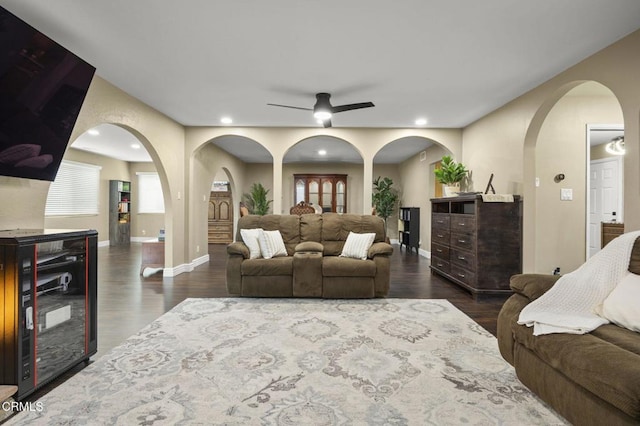 living room with dark hardwood / wood-style floors