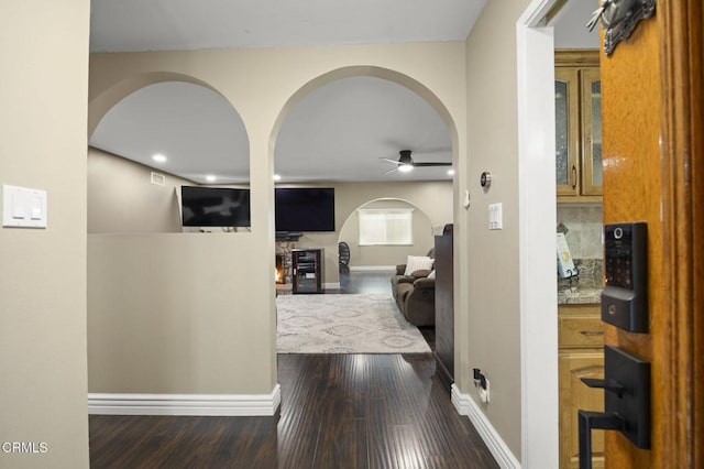 hall with hardwood / wood-style floors