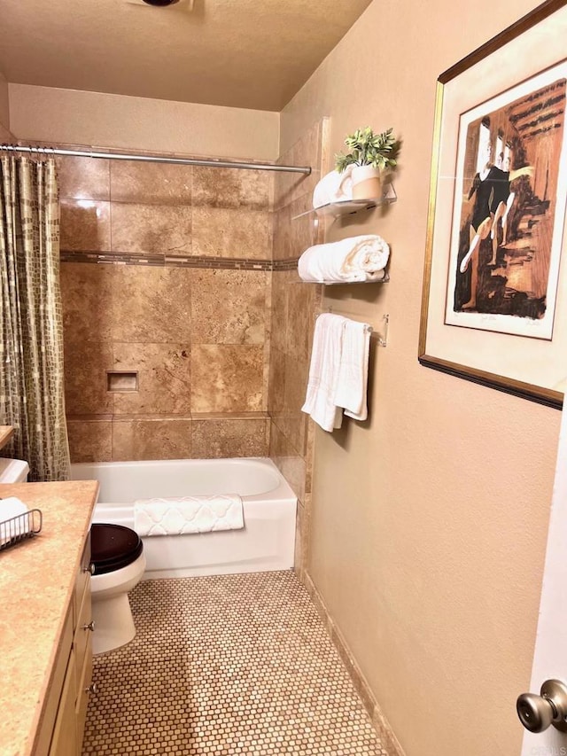 full bathroom featuring vanity, toilet, and shower / bathtub combination with curtain