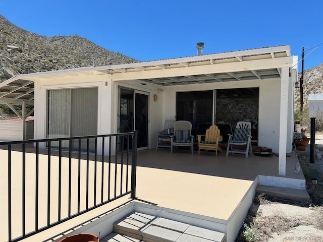 back of property with a patio area