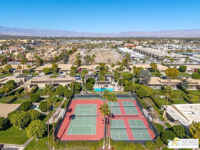 birds eye view of property featuring a mountain view