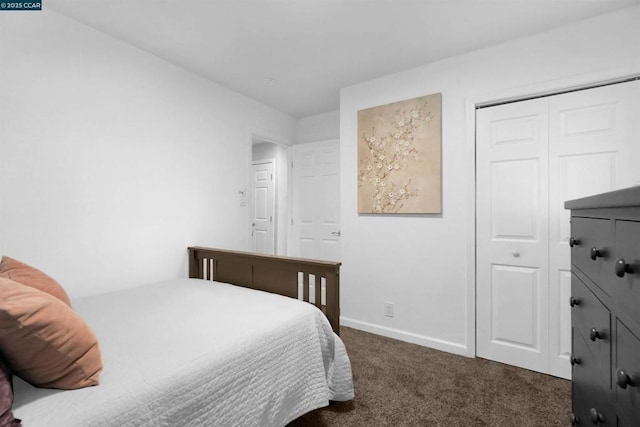 carpeted bedroom with a closet