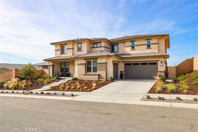 39767 Larkspur Ter, Temecula, CA 92591 - view of front of property with a garage, driveway, and stucco siding