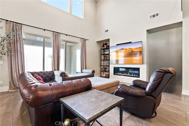 living room with a healthy amount of sunlight