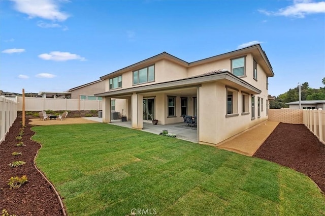 39767 Larkspur Ter, Temecula, CA 92591 - back of property with stucco siding, a fenced backyard, and a patio