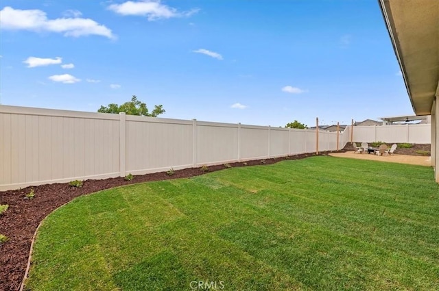 39767 Larkspur Ter, Temecula, CA 92591 - fenced backyard with a patio area