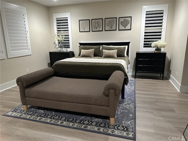 39767 Larkspur Ter, Temecula, CA 92591 - bedroom featuring baseboards and wood finished floors