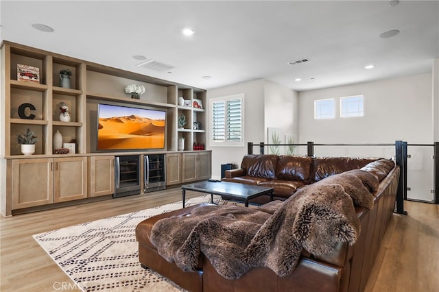 39767 Larkspur Ter, Temecula, CA 92591 - living room with beverage cooler, light wood-style floors, plenty of natural light, and recessed lighting