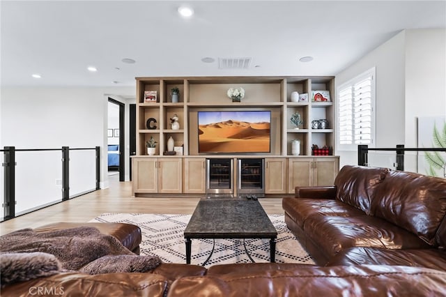 39767 Larkspur Ter, Temecula, CA 92591 - living room featuring wine cooler, light wood finished floors, and recessed lighting