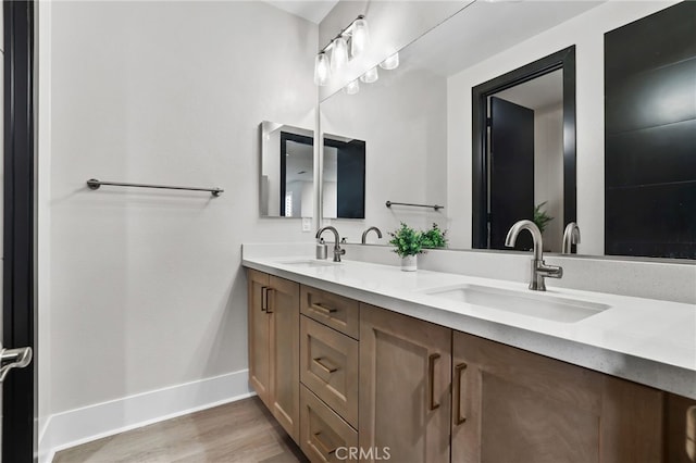39767 Larkspur Ter, Temecula, CA 92591 - bathroom with double vanity and wood finished floors