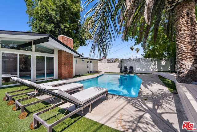 view of pool with a patio area