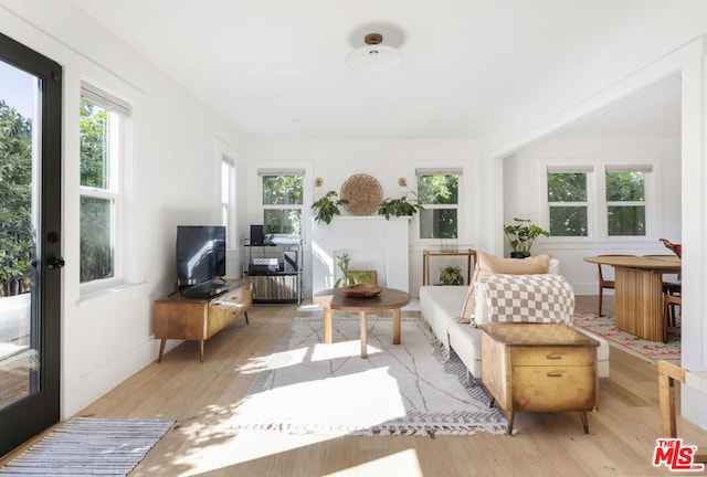 sunroom featuring a wealth of natural light