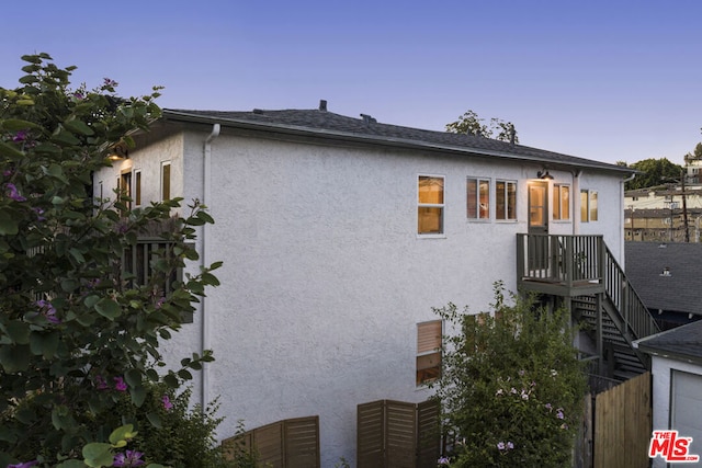 view of property exterior at dusk