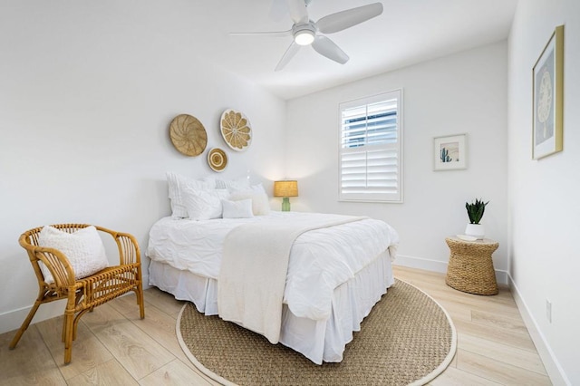 bedroom featuring ceiling fan and light hardwood / wood-style flooring