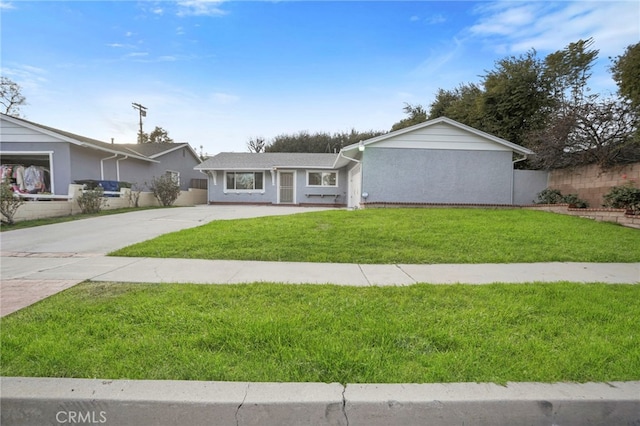 ranch-style house with a front lawn