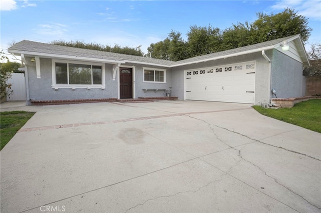 ranch-style home with a garage