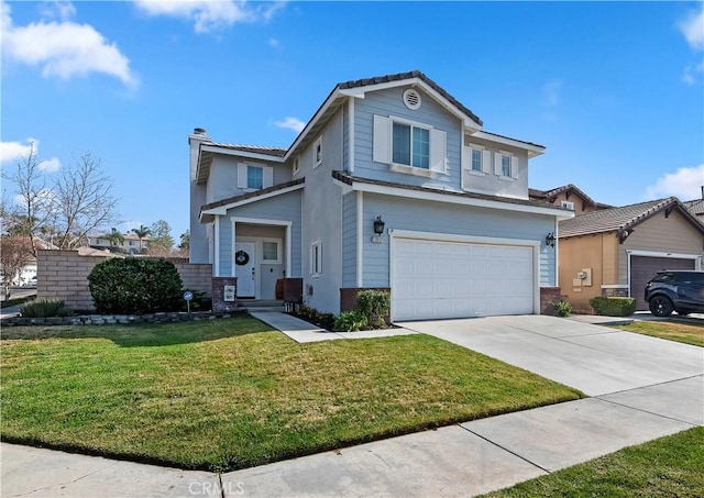 view of property featuring a garage and a front lawn