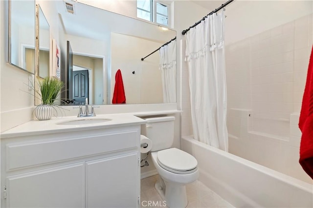 full bathroom featuring vanity, shower / bath combination with curtain, and toilet