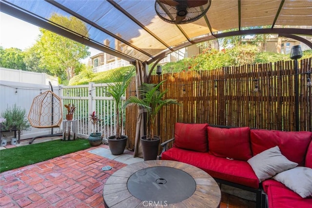 view of patio with ceiling fan, outdoor lounge area, and a pergola