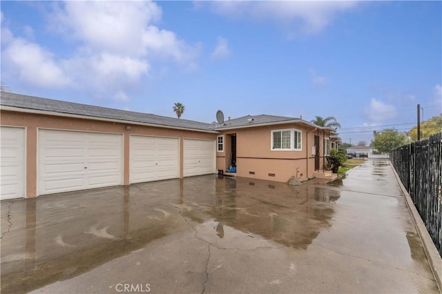 exterior space featuring a garage