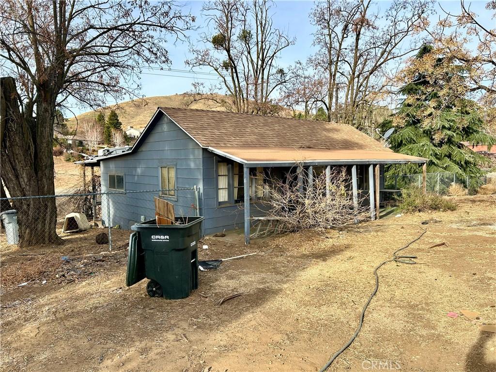 view of side of property with a mountain view