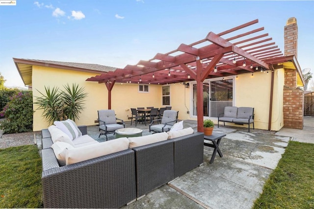 view of patio / terrace with a pergola and an outdoor hangout area