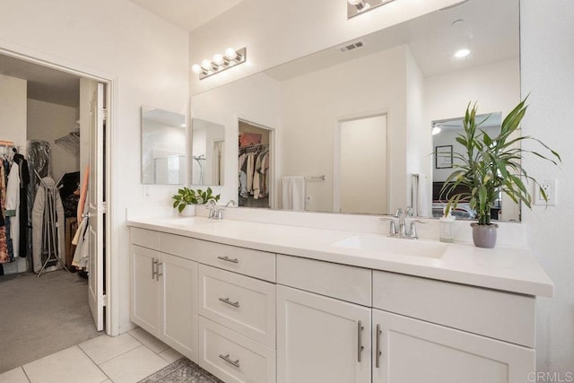 bathroom featuring vanity and tile patterned flooring