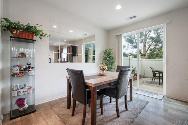 dining area featuring hardwood / wood-style floors