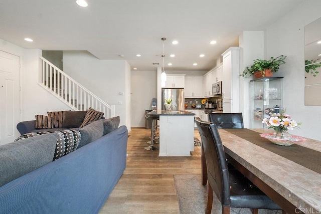 kitchen with appliances with stainless steel finishes and light wood-type flooring