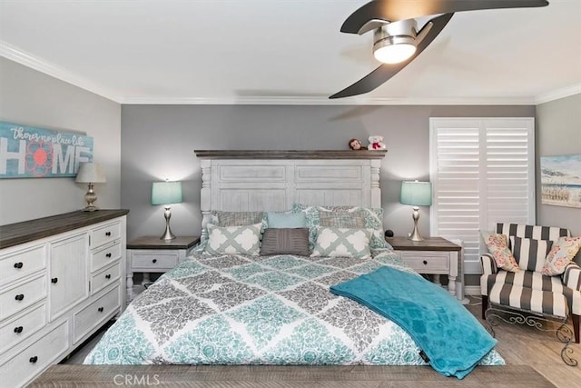 bedroom featuring ceiling fan and ornamental molding