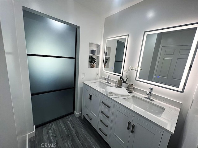 bathroom featuring vanity and hardwood / wood-style floors