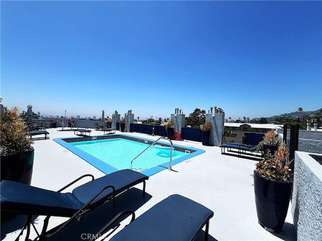 view of pool featuring a patio area