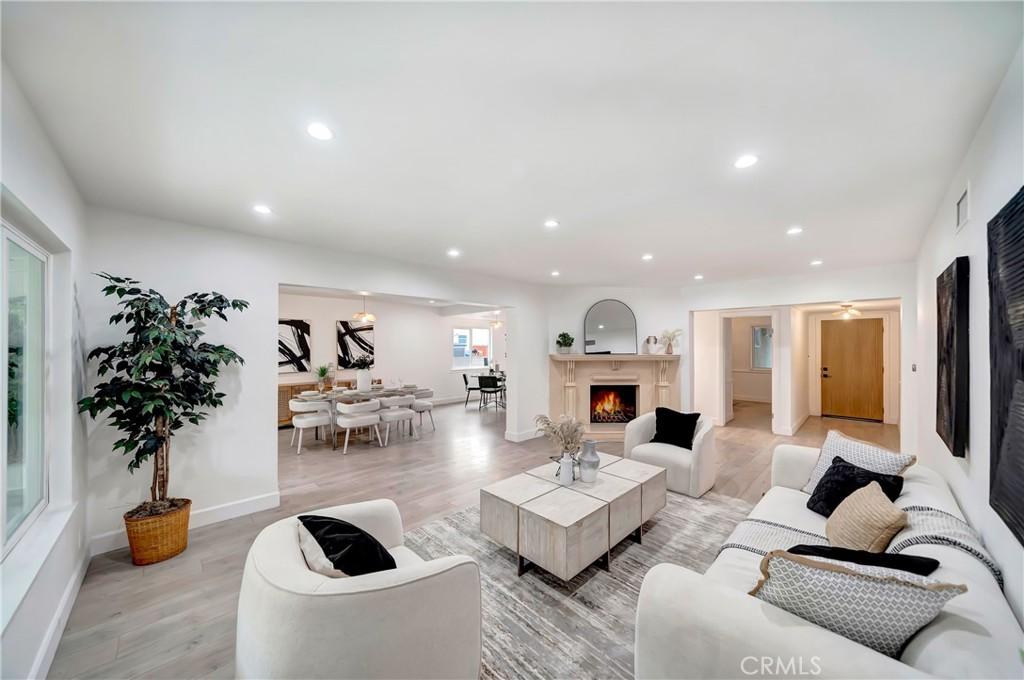 living room with light hardwood / wood-style flooring