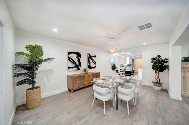 dining area featuring light hardwood / wood-style flooring