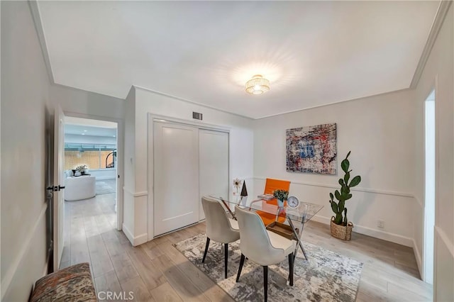 dining room featuring light hardwood / wood-style floors