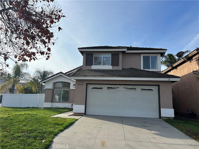 front of property featuring a garage and a front yard