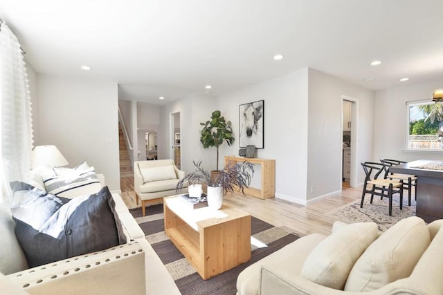 living room with light hardwood / wood-style flooring