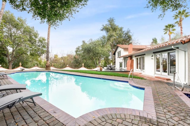 view of pool with a patio area