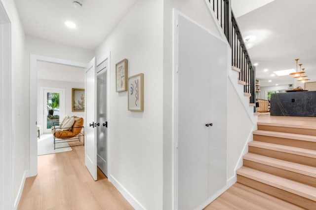 hallway featuring light wood-type flooring