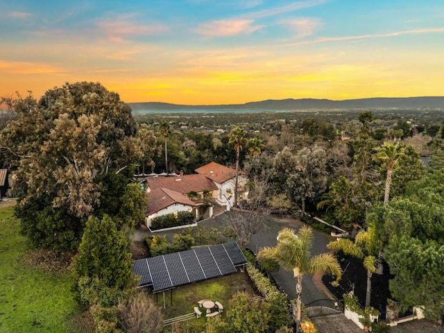 aerial view at dusk with a mountain view