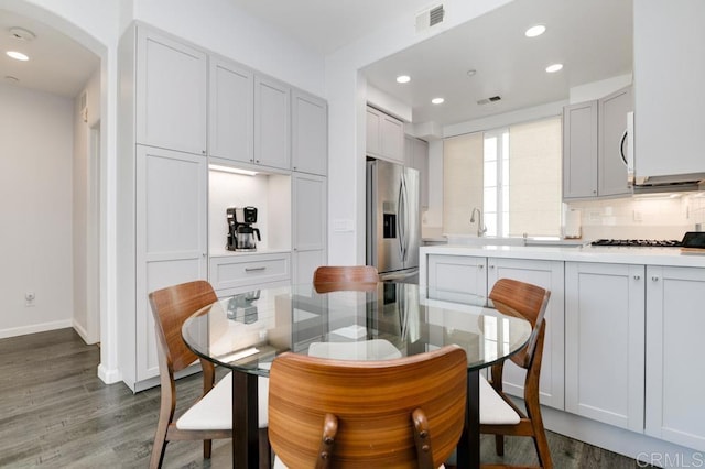 dining room featuring dark hardwood / wood-style floors