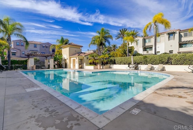 view of pool featuring a pergola and a patio area