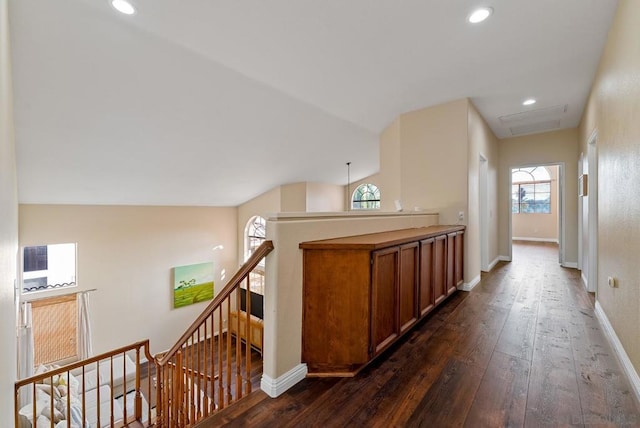 hallway with dark hardwood / wood-style floors