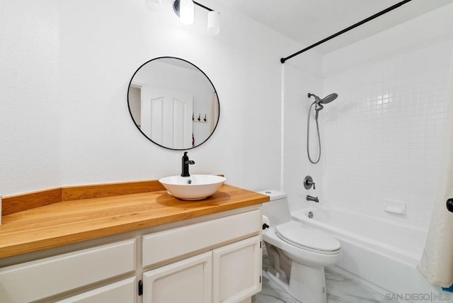 full bathroom with vanity, tub / shower combination, and toilet