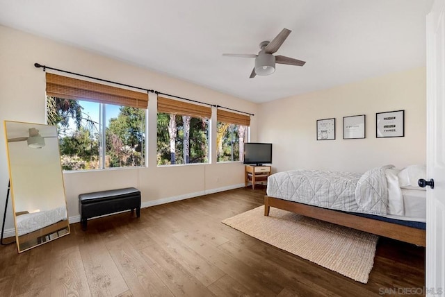 bedroom featuring ceiling fan and wood-type flooring