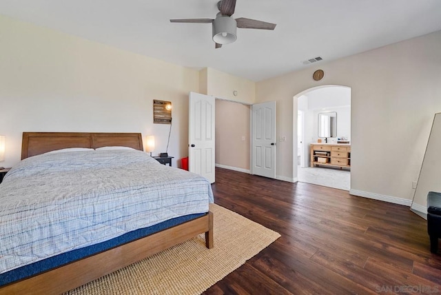 bedroom with dark wood-type flooring and ceiling fan