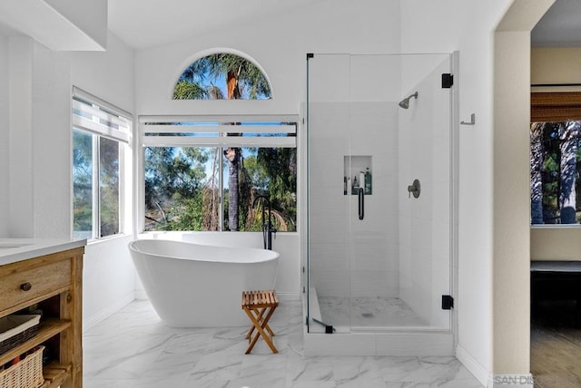 bathroom with plus walk in shower and vanity