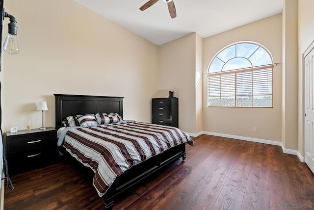 bedroom featuring dark wood-type flooring and ceiling fan