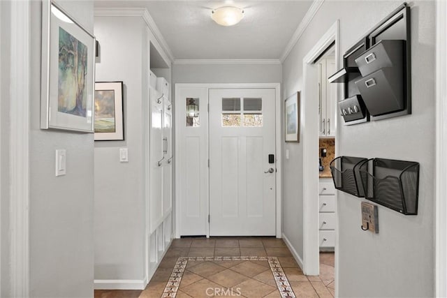 entryway featuring light tile patterned flooring, crown molding, and baseboards